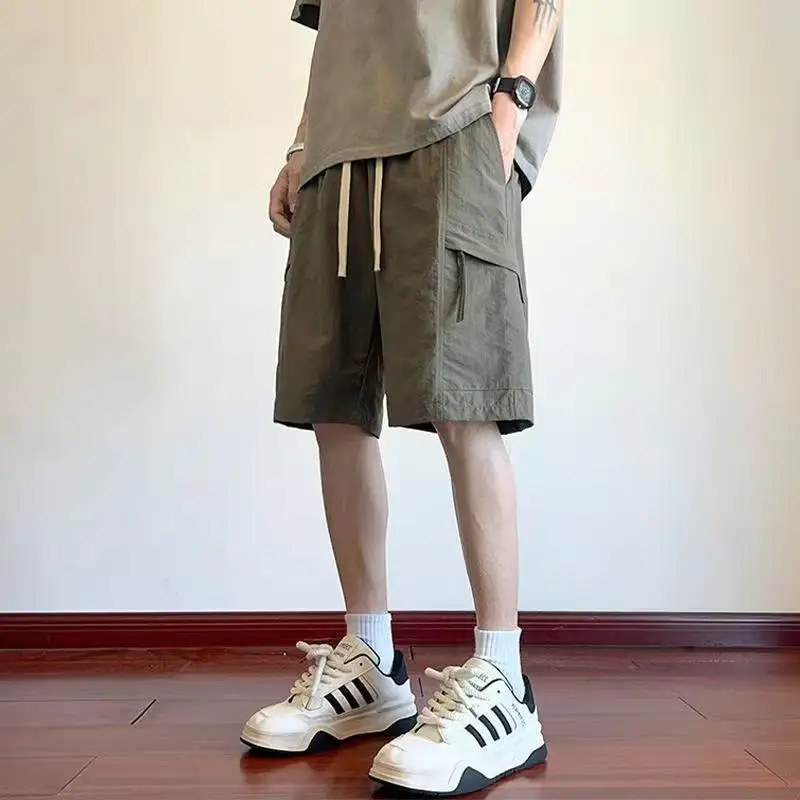

Мужские рабочие шорты из ледяного шелка, новые летние модные свободные брюки средней длины, тонкие повседневные брюки с пятью точками