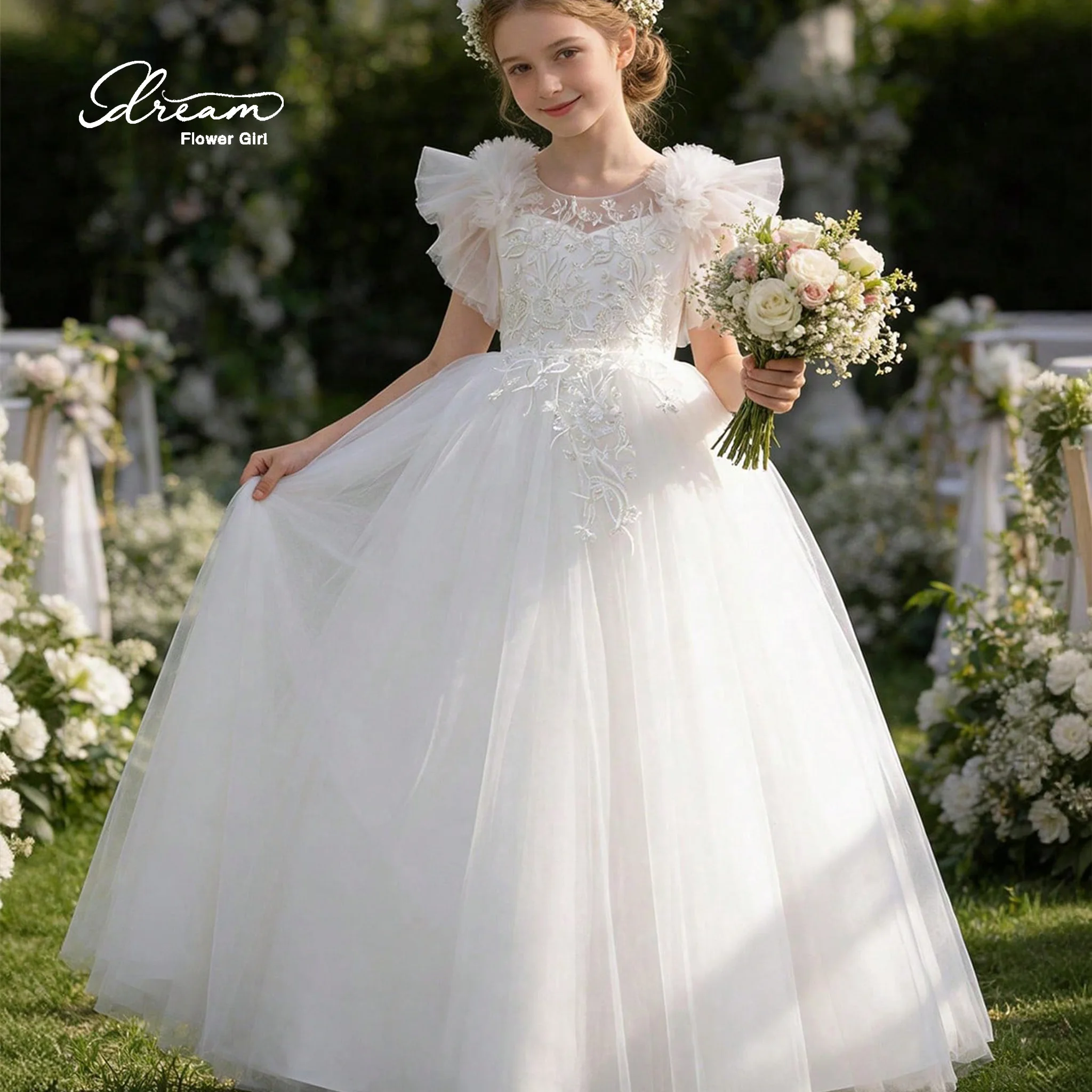 Girls' white round-neck formal party dress with a full skirt featuring tulle embroidery and a bow at the back