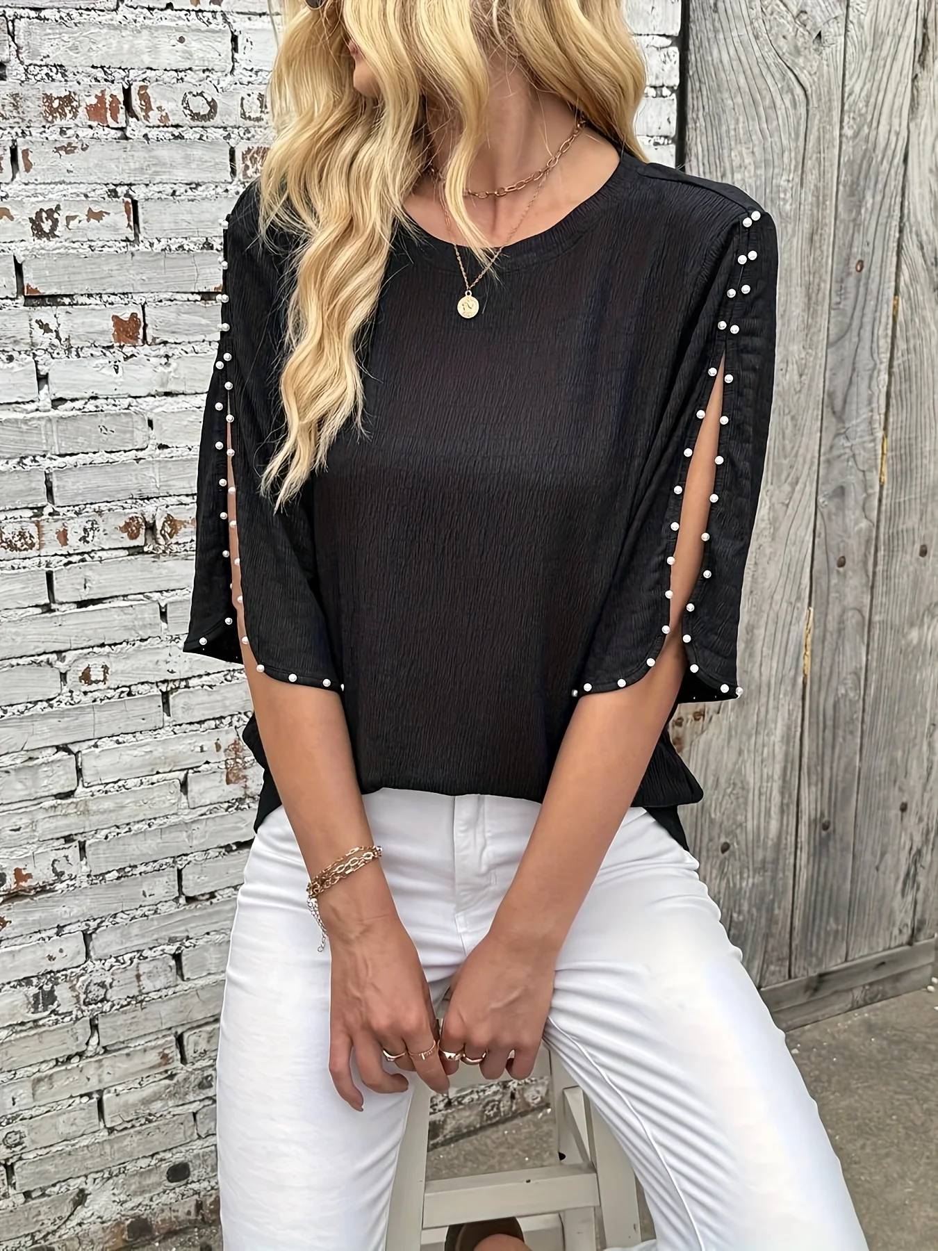 

Women's spring and summer casual short sleeved round neck side slit bubble sleeve bead decoration black top T-shirt