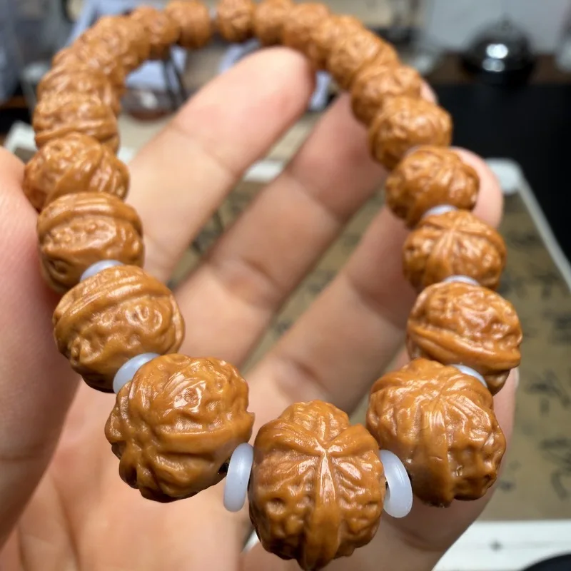 Triangular walnut, white lion, monkey head bead bracelet, finely carved, seed and original skin, polished beads, Buddhi