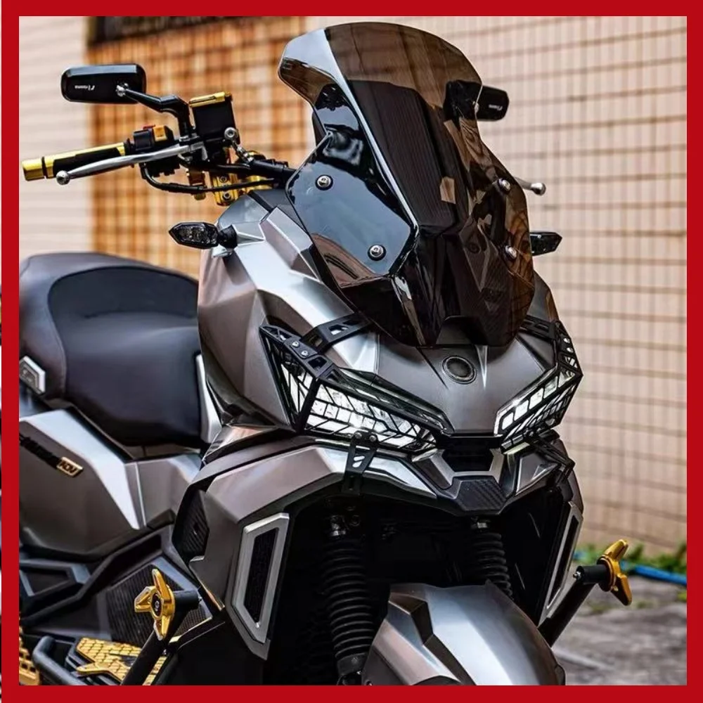 Headlight protector for SYM ADX 125 motorcycles. This is a non-destructive headlight protector/lens for SYM ADX 125 motorcycles.