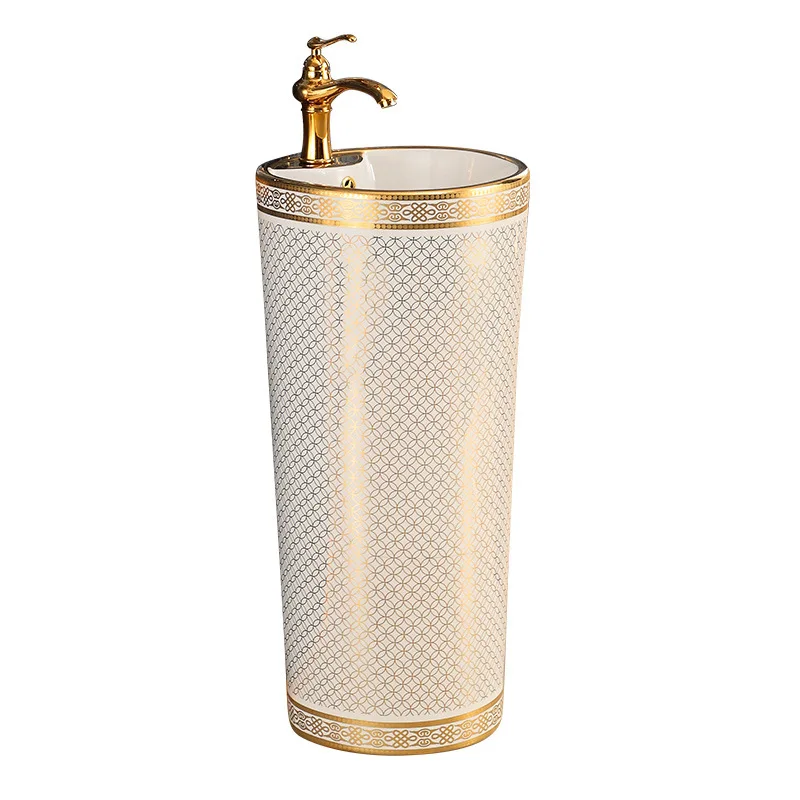 

Golden round washbasin integrated, floor-to-ceiling column basin