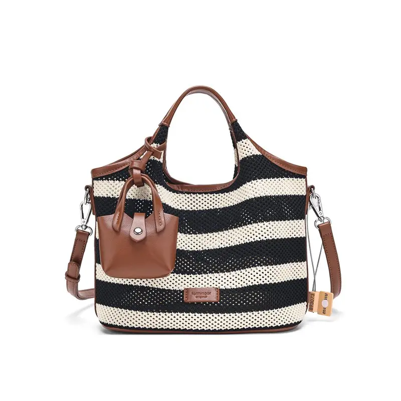 

2025 new fashion women black white striped bucket bag summer hollow woven design multifunctional vacation beach handbag bag