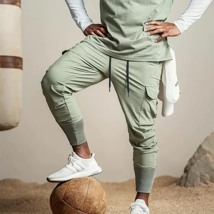 المشي لمسافات طويلة متعددة حقيبة السراويل انغلق ارتداء مقاومة القدم السراويل عارضة الرجال السراويل التجفيف السريع تنفس الجري الرياضة