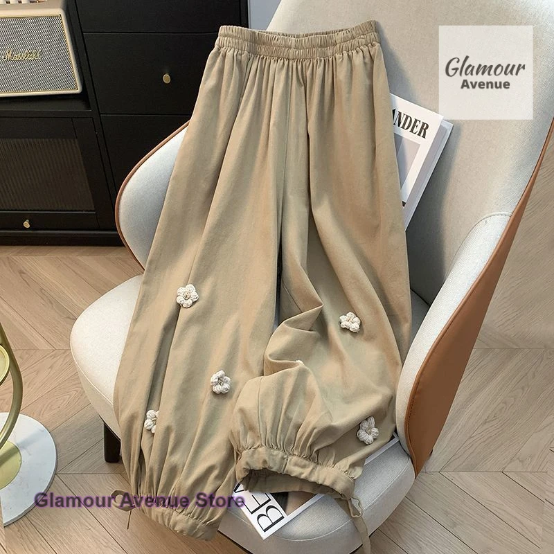 

Korean-style fashion three-dimensional flower bloomers women's summer new loose high waist and slim nine-point harem pants.