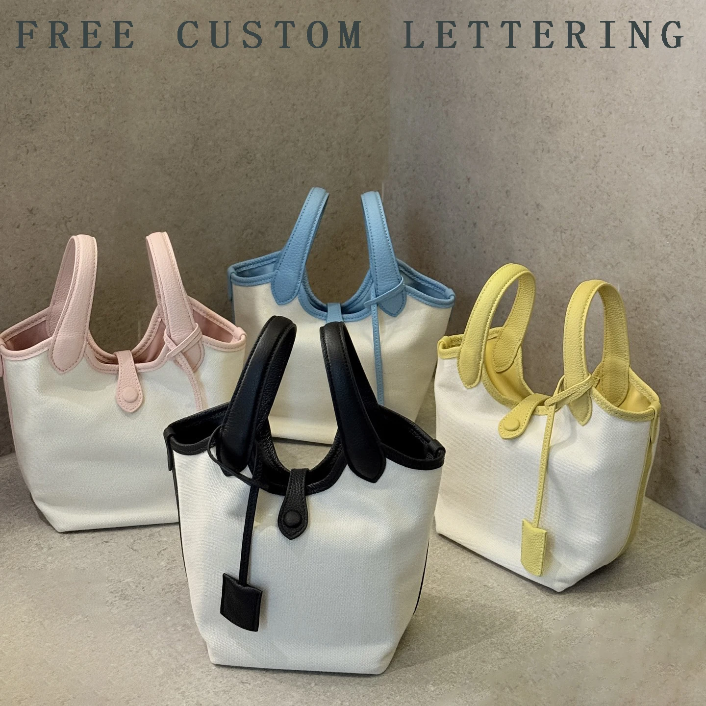 

Canvas spliced ​​leather bucket bag free initials 2025 new niche design casual one-shoulder crossbody bag fashion ladies handbag