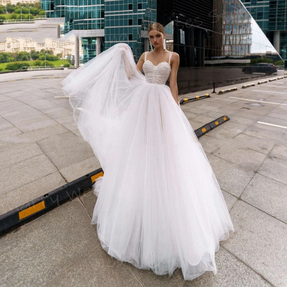 Vestidos De Novia bohemios para mujer, elegantes Vestidos De Novia con tirantes finos, modernos, sin mangas, con espalda descubierta