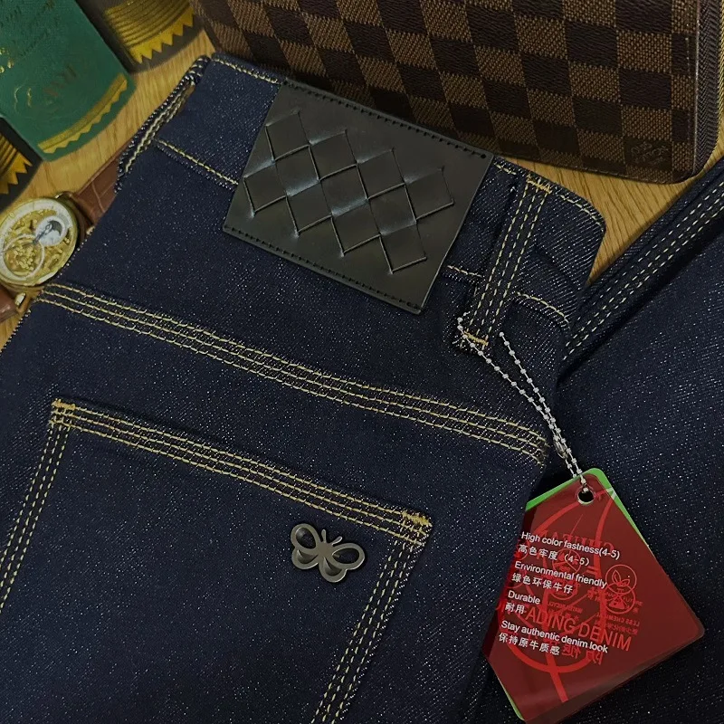 2025 high-end jeans men's light luxury trend original color denim slim fit small foot elastic washed pants