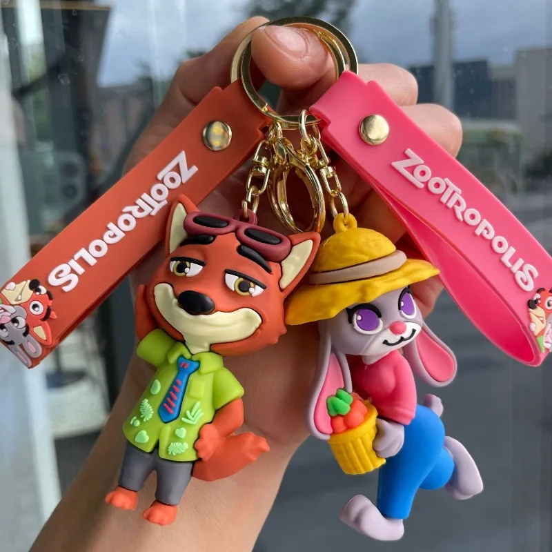 مجموعة سلسلة مفاتيح للزوجين من Disney Anime Zootopia Judy Hopps وNick Wilde - شماعة حقيبة الظهر مناسبة لتقديم هدايا عيد الميلاد