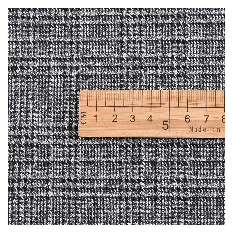 سترة واقية مقلدة من القماش تشبه الصوف بنصف فحص وسراويل بدلة