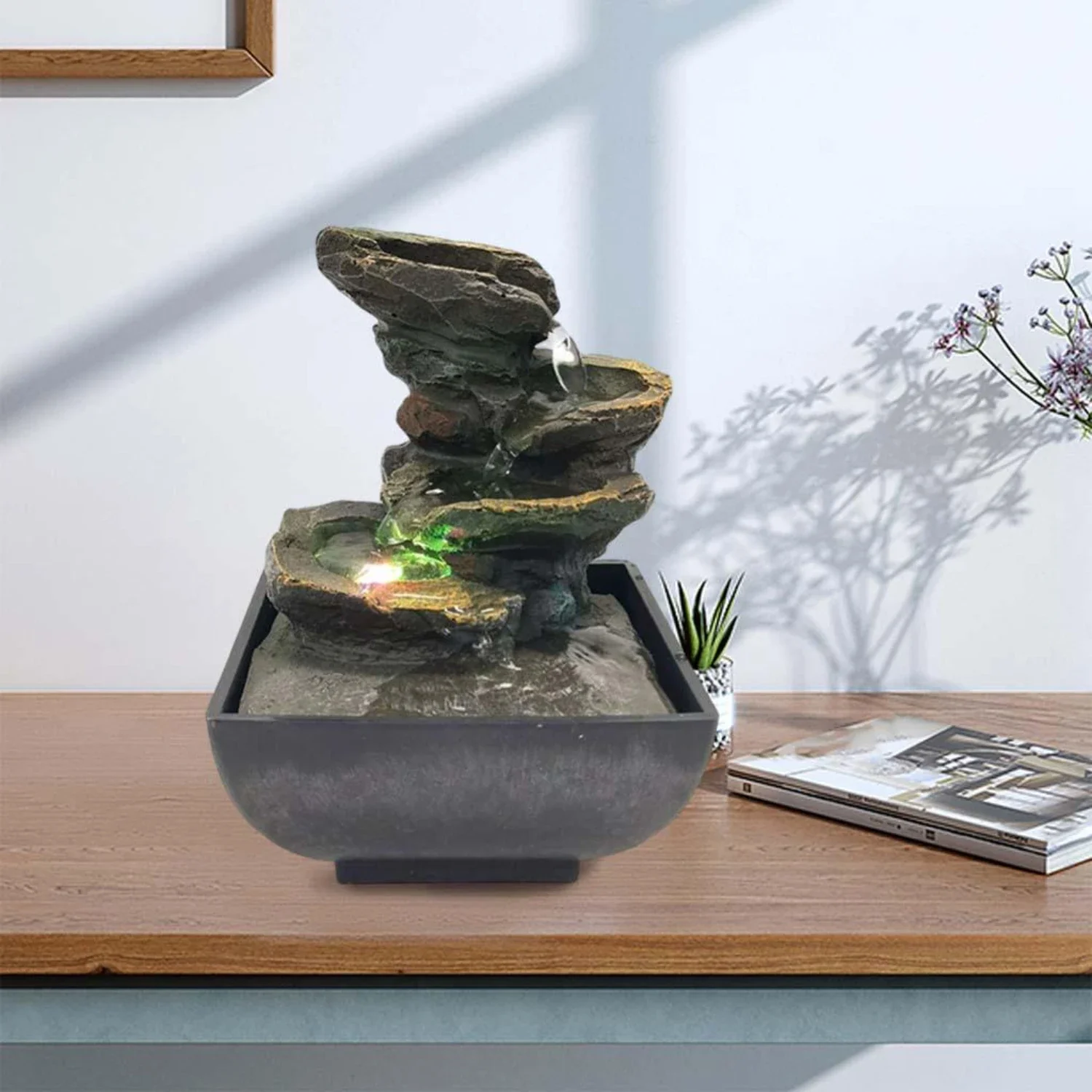 

Transform your living or working area into a peaceful and elegant sanctuary with this exquisite, stylish decorative fountain. Im