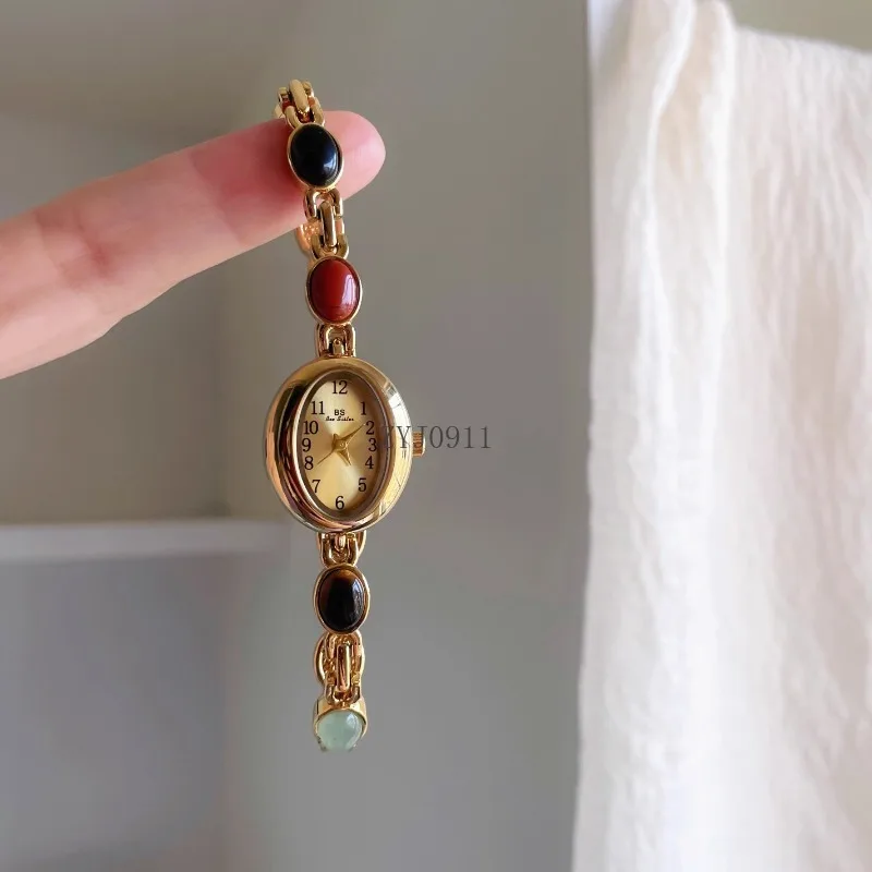 Montre-bracelet rétro élégante, niche de tempérament antique moyen, montre à quartz antique simple