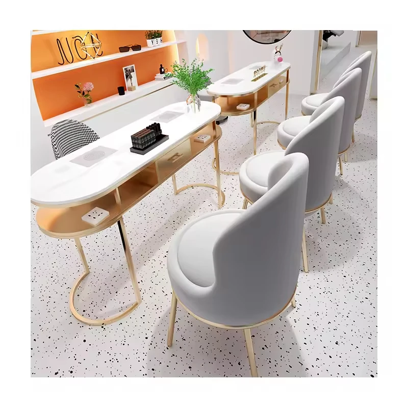 xx-Stylish Manicure Station with Green Upholstered Chairs Gold Accents Modern Look Ideal for Nail Studio Business^