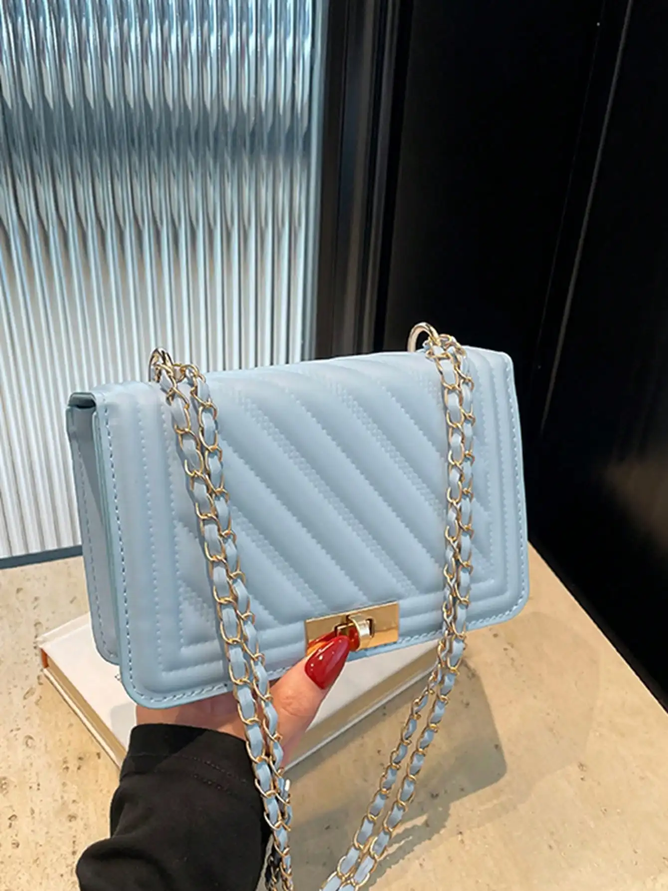 

Light Blue Quilted PU Mini Crossbody Bag with Gold Chain Strap