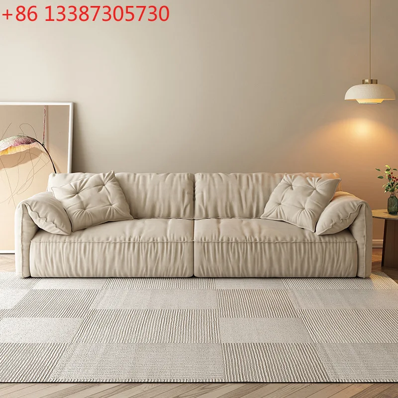 

Итальянский минималистичный матовый диван из ткани «слоновье ухо» для небольшой квартиры в современном стиле