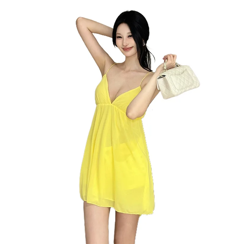 Vestido de playa adeazante para mujer, primavera 2025, con cuello en V profundo, tirantes, tejido de poliéster, falda con a...