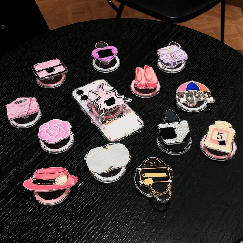 

Light Luxury High-end Strong Magnetic Mobile Phone Stand Holder Bracket Trend MagSafe Mobile Phone Accessory Phone Grip Tok