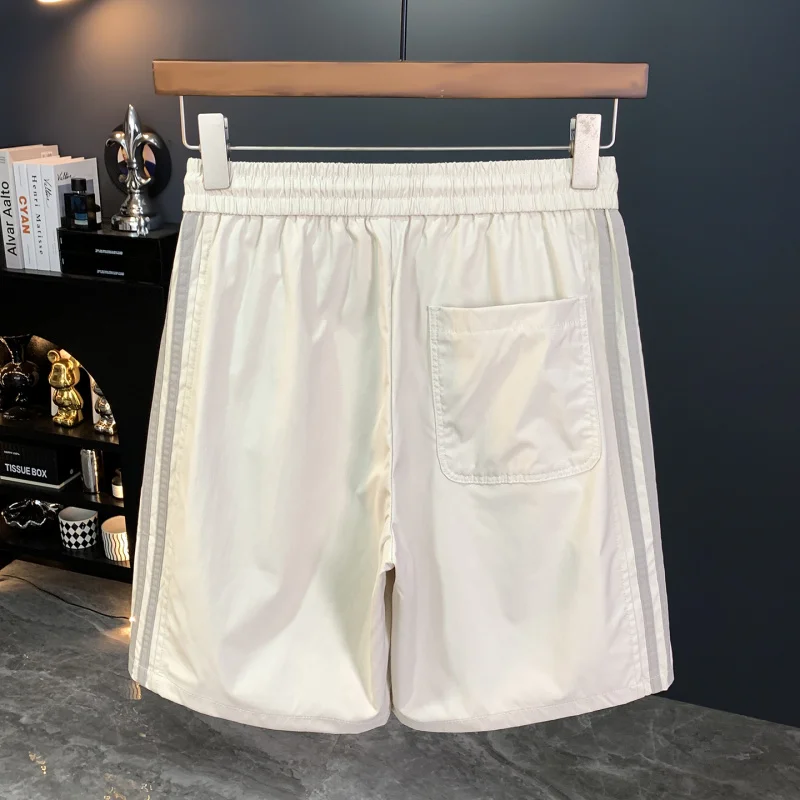 شورت جديد لعام 2025 للرجال في الصيف، رفيع، فضفاض، مسامي، مرن، رياضي للشاطئ في الهواء الطلق، سروال خمسة أرباع