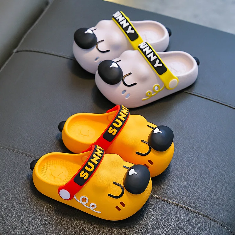

Летние детские тапочки для мальчиков, нескользящие, с мягкой подошвой, дышащие, с защитой от ударов; милые пляжные тапочки-клоун для девочек с отверстиями