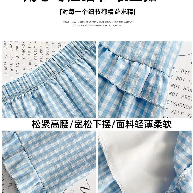 Blauw en wit geruite taartrok dames lente zomer middellange hoge taille afslankende grote uitlopende paraplu