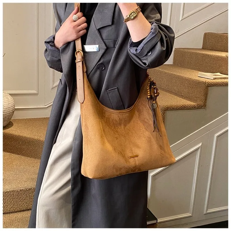 

Crescent Hobo Shoulder Bag with Suede Finish & Tassel Adjustable Strap, Casual Style for Work, School, Travel & Everyday Errands