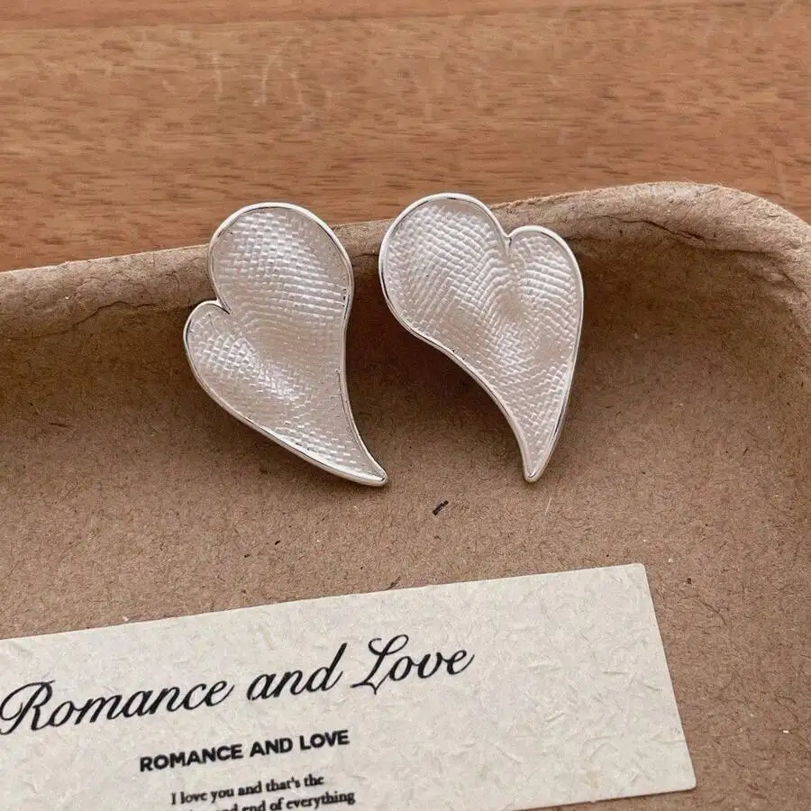 

Elegant Asymmetrical Heart Stud Earrings With Textured Surface, Minimalist Luxury Jewelry For Women