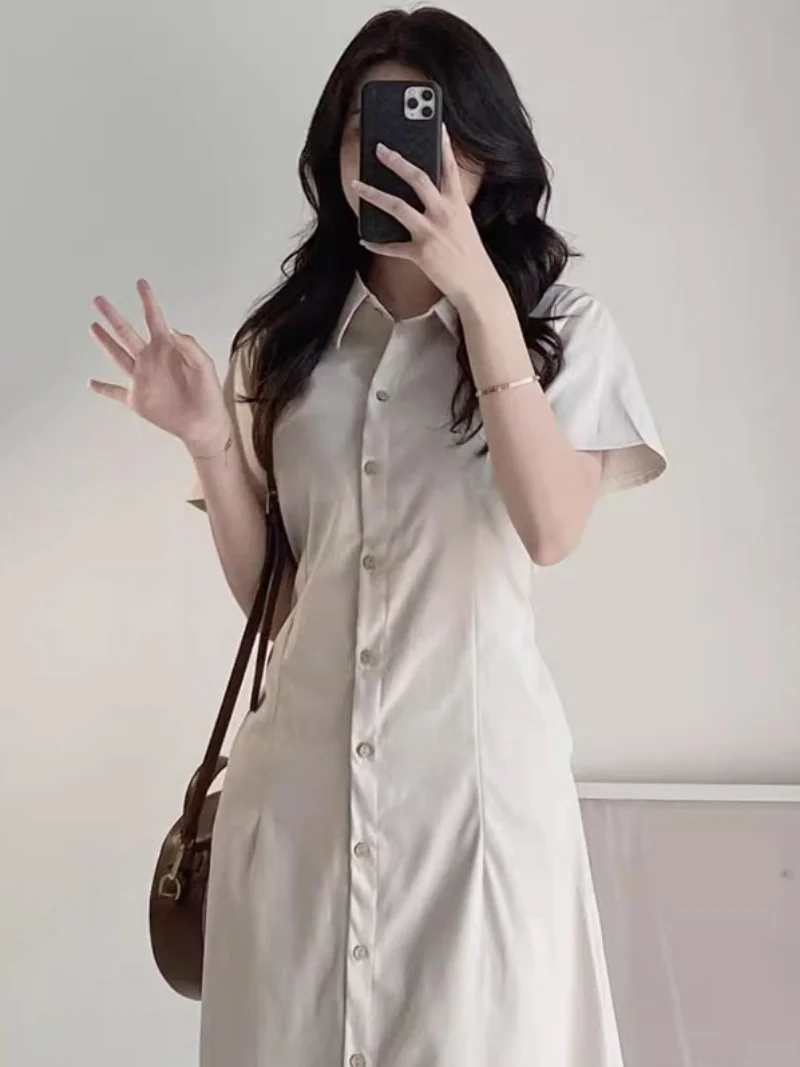 シックなレトロなターンダウン襟シングルボタン半袖シャツドレスウエスト締め痩身ロングスカート女性の夏