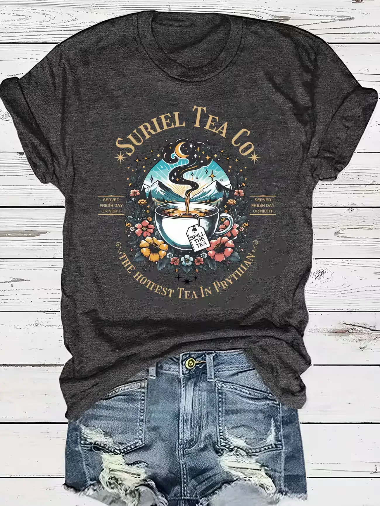 

Plus size women's short sleeve T-shirt Surriel Tea Co Tea Cup With Moon Flowers And Mountains Python Text Below Everyday