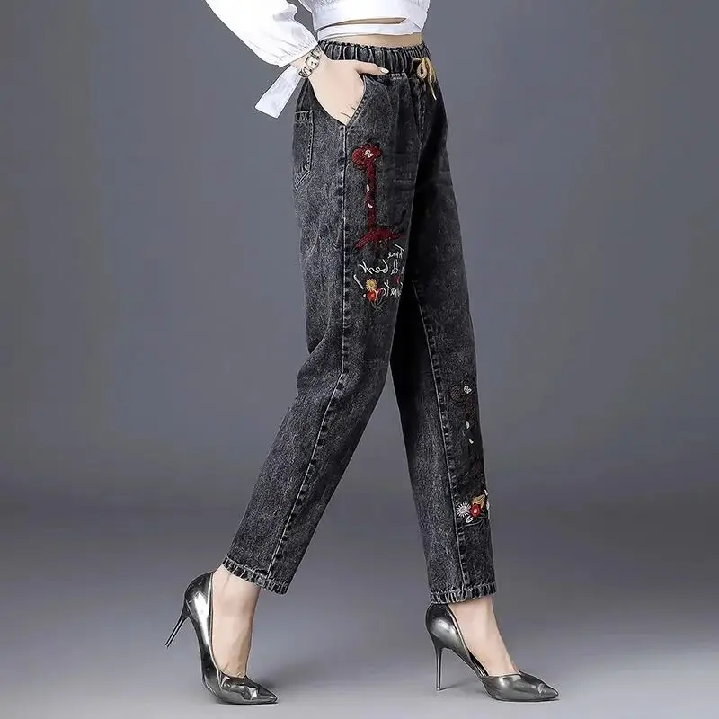 Drawstring elastic waisted jeans for women in the autumn of 2025 plus size loose slimming embroidery design Harun pants