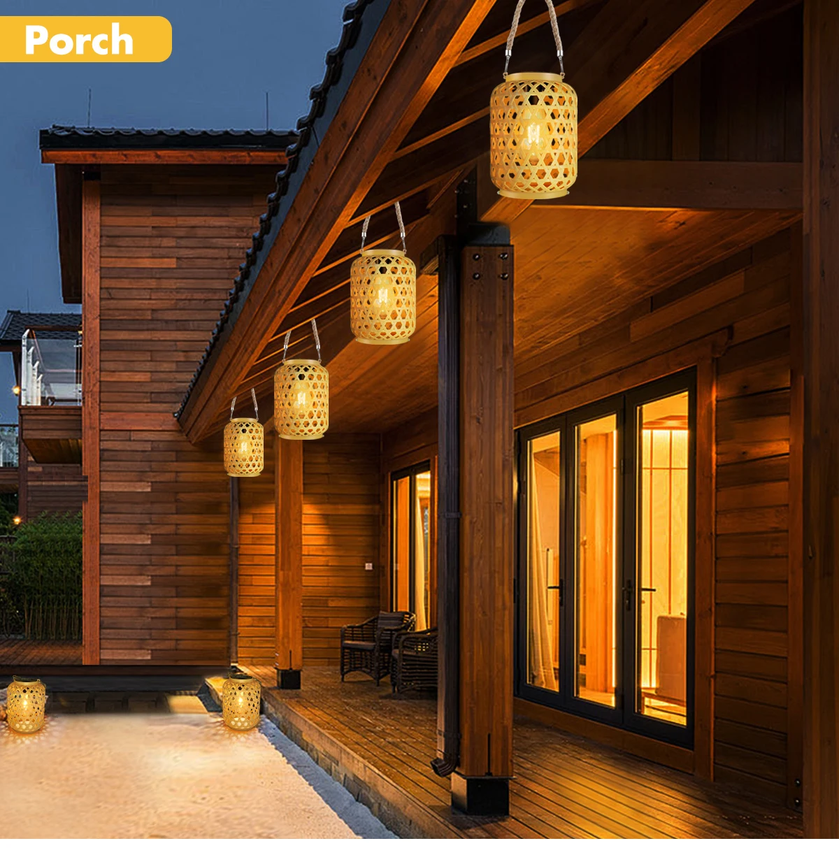 NordicLoom rattan lantern held by top handle showing compact portable size
