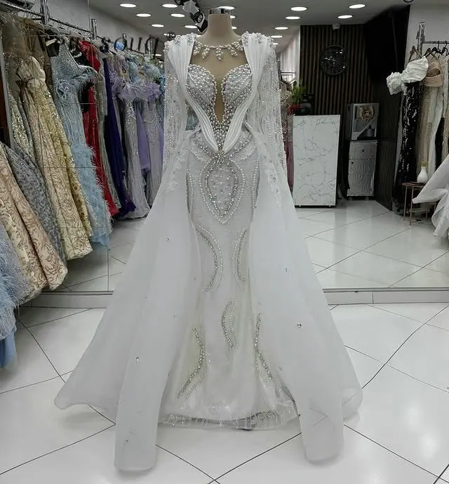 

Белые длинные рукава, кристаллы, жемчуг, бисер, платья русалки для выпускного вечера с верхней юбкой, элегантные свадебные платья для помолвки по индивидуальному заказу