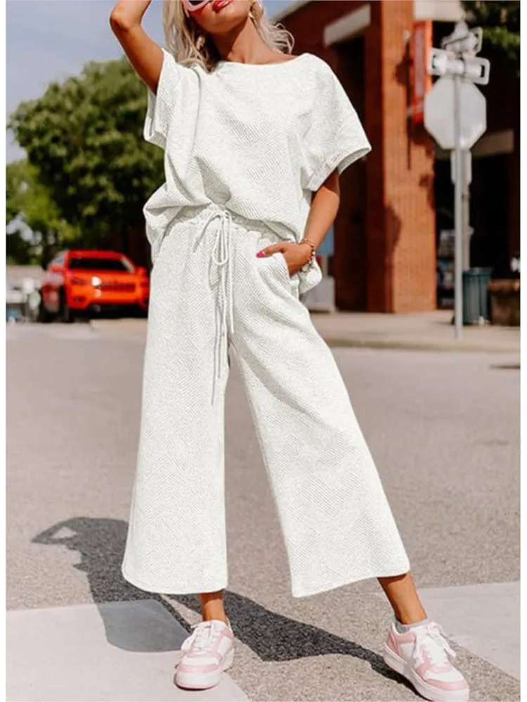 

Casual Women's Sportswear 2 Piece Set Solid Color O-Neck Short Sleeve Top Lace-Up Wide Leg Pants Suit Female Loose Ladies Outfit