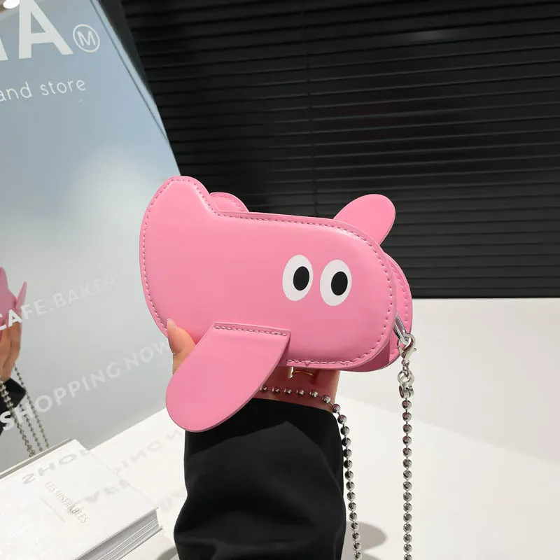 

2025 стильная маленькая кожаная сумка через плечо в форме милого мультяшного самолета для женщин и девочек, мини-цепочка на плечо, кошелек с губной помадой, детские забавные сумки