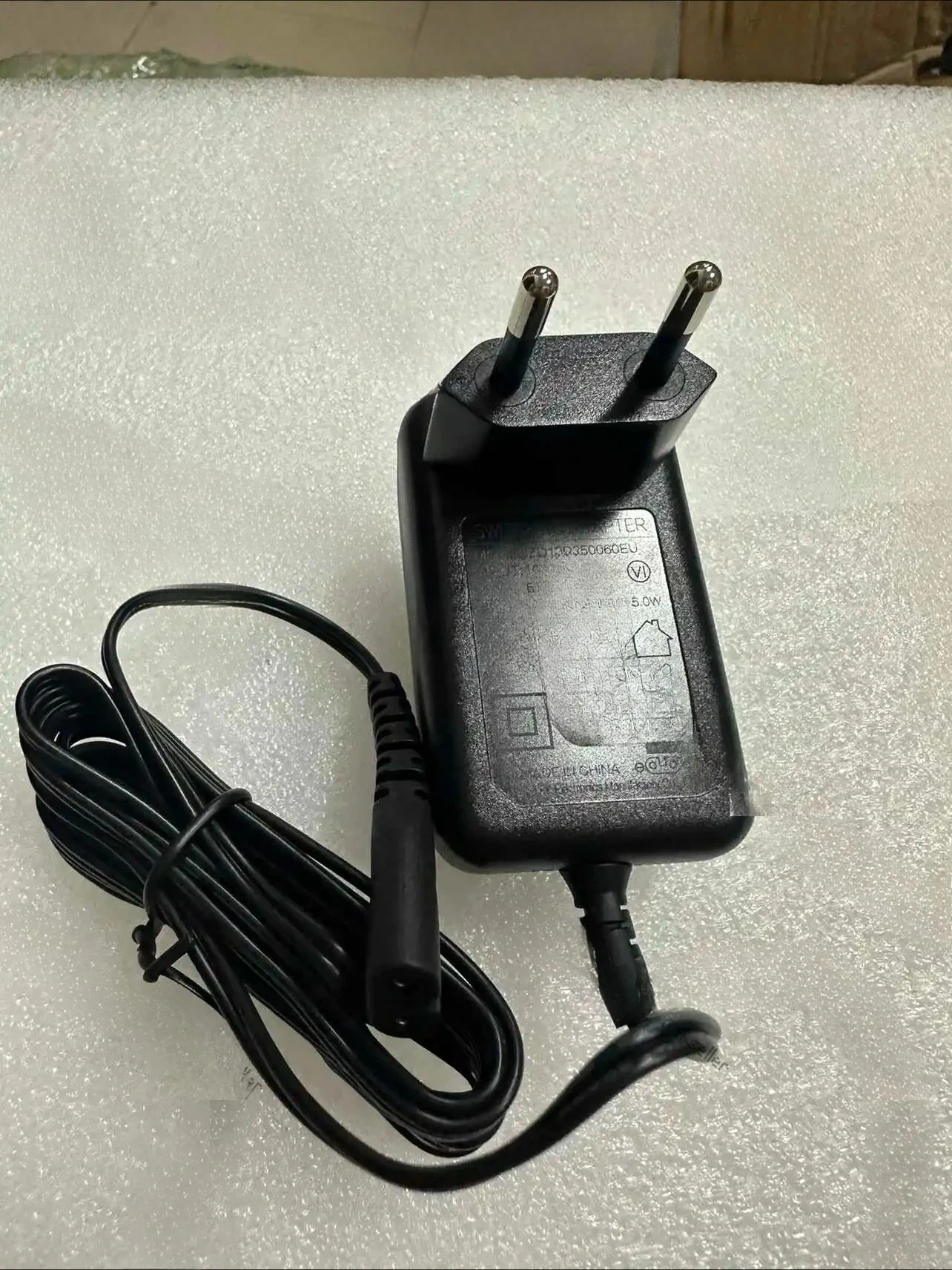 

Адаптировано для пылесоса, аксессуары для адаптера питания, европейский стандарт, зарядный кабель 25V0.6A ZD12D250060EU