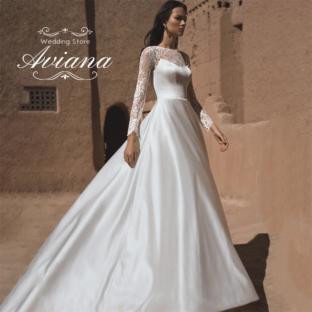Aviana فستان زفاف مخصص سويب تراين على شكل حرف a رقبة دائرية وأكمام طويلة وزر دانتيل مطرز وصمة عار 2025 طول الأرض بسيط #2