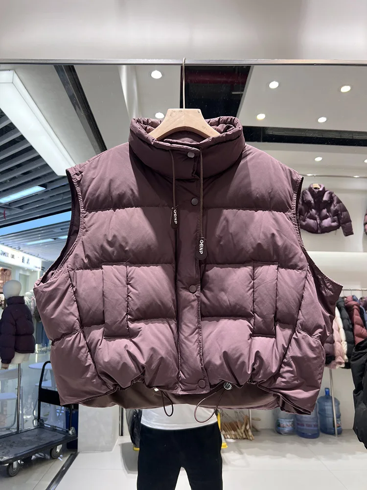 Women's short style stand collar down jacket vest 2025 winter new fashion design loose white duck down jacket trend