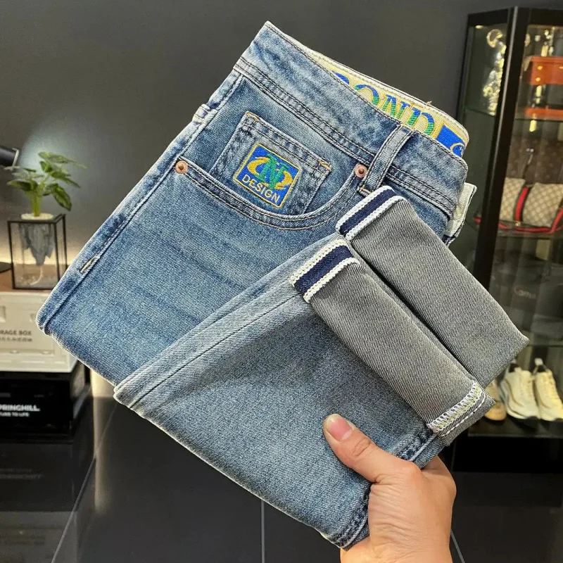 

2026 New Fashion Men's Jeans Retro Blue Distressed Denim with Colorful Logo Embroidery Design Stretch Fabric Casual Style Slim F