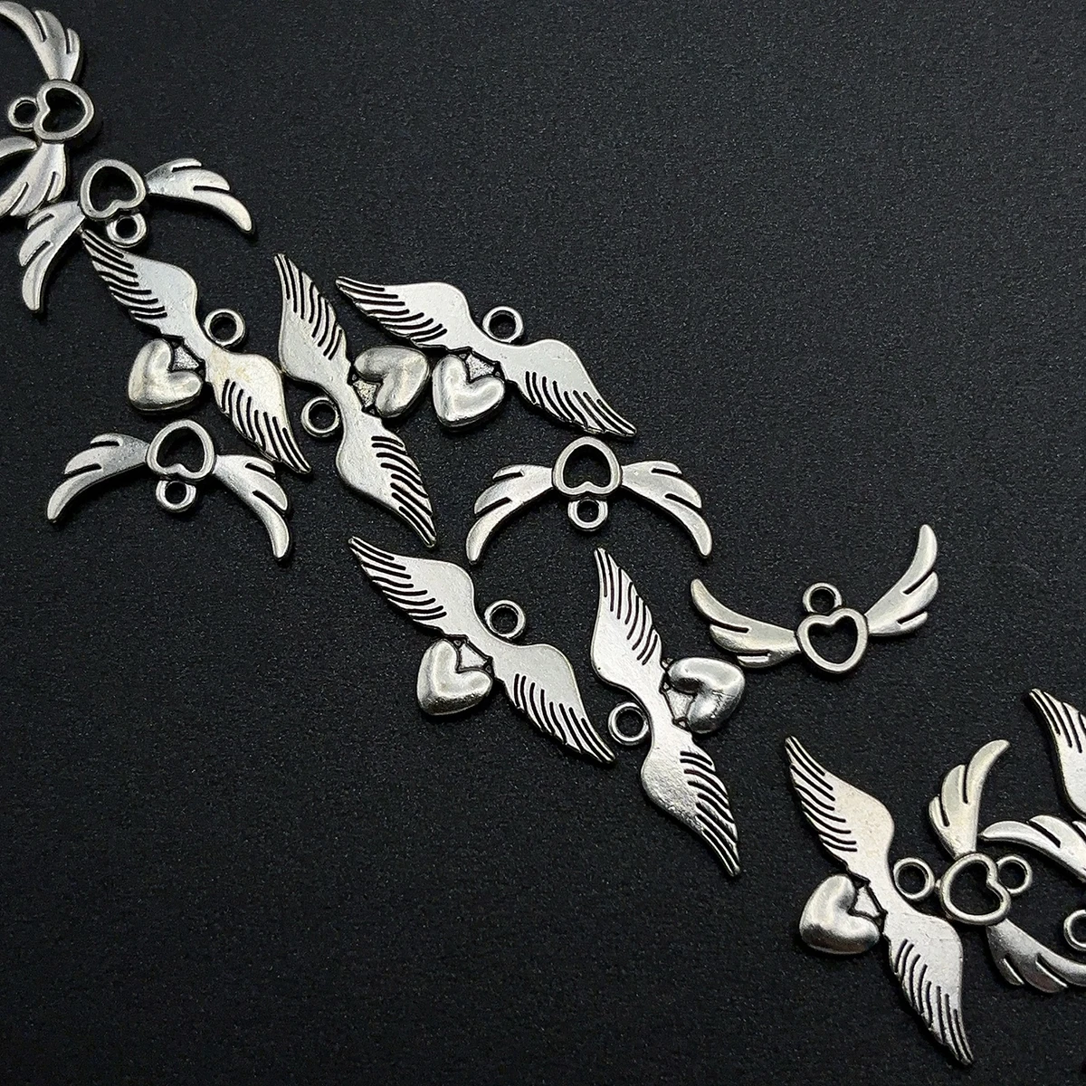 14-Piece Set of Angel Wings DIY Handmade Accessories, Featuring Two Styles: Three-Dimensional Heart Wings and Hollow Heart Wings, Suitable for DIY Bracelets, Necklaces, Earrings, Pendants, and Handmade Beaded Decoration Accessories view 3