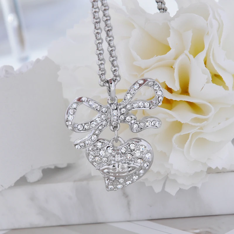 

Подвеска-кулон из стерлингового серебра S925 с полным бриллиантовым паве в форме банта, элегантный модный аксессуар высокого класса