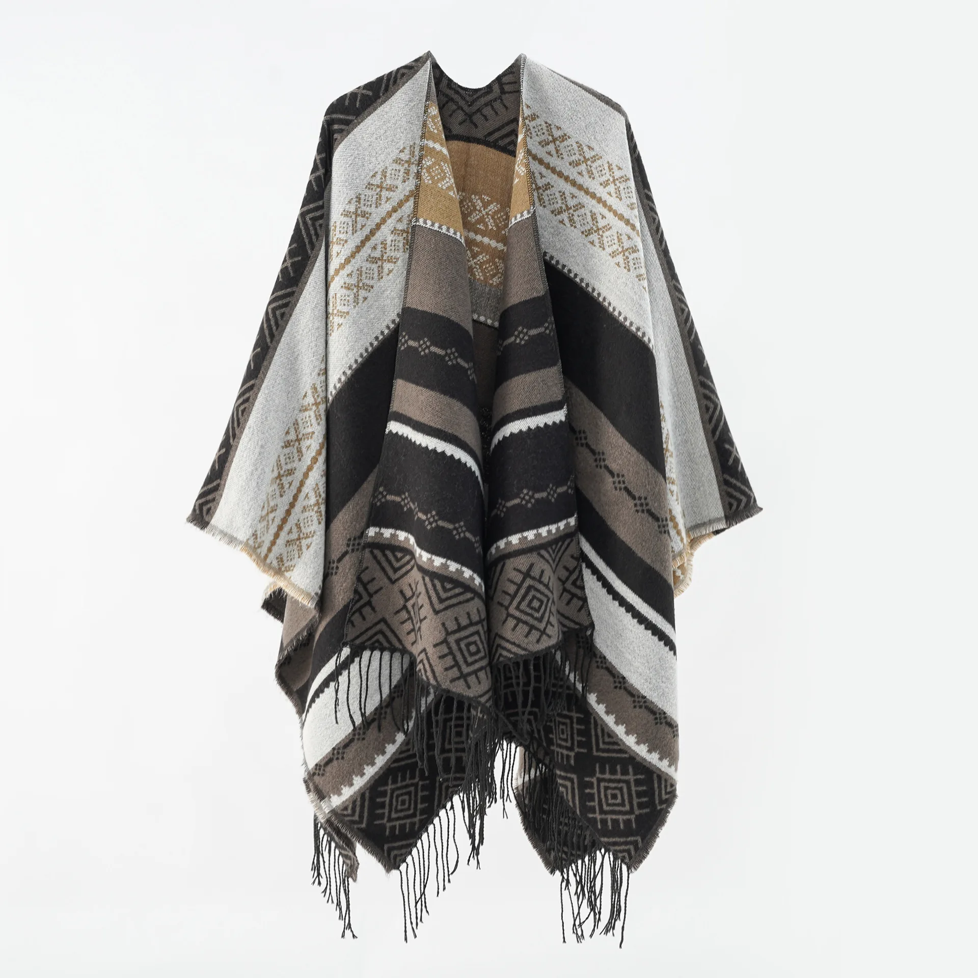 A woman\'s shawl fringed with geometric stripes for casual warmth and cold protection