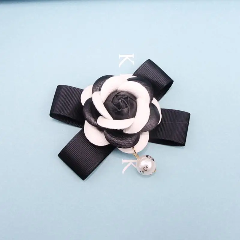 كاميليا لؤلؤة Bowknot Diy إكسسوارات الشعر الصدار طوق زهرة السيدات حقيبة حقيبة المفاتيح قضية الهاتف المحمول سلسلة