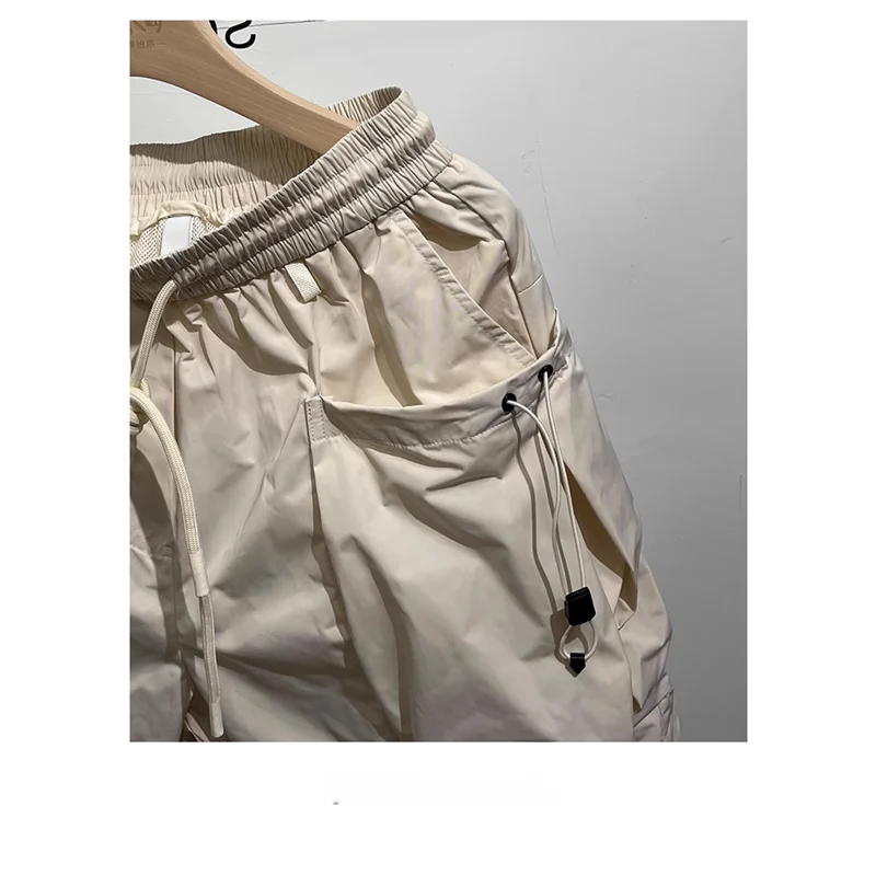 

Повседневные мужские летние дышащие тонкие спортивные свободные брюки средней длины пяти четвертей молодежные прямые брюки Vitali