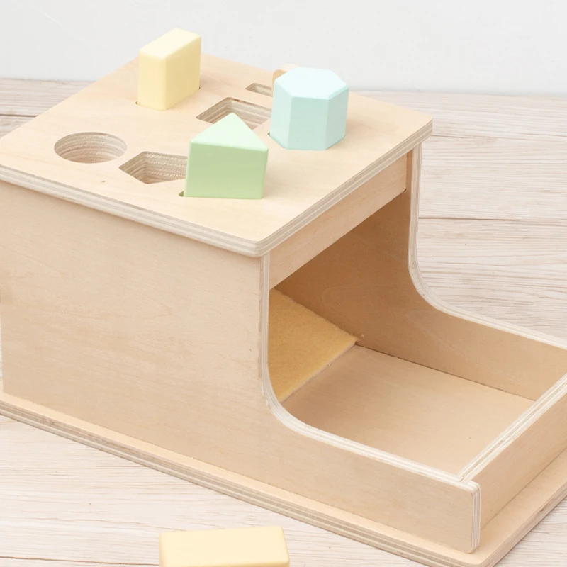 Wooden Shape Matching Toy Box with assorted colorful blocks helps children develop early hand-eye coordination and shape recogni