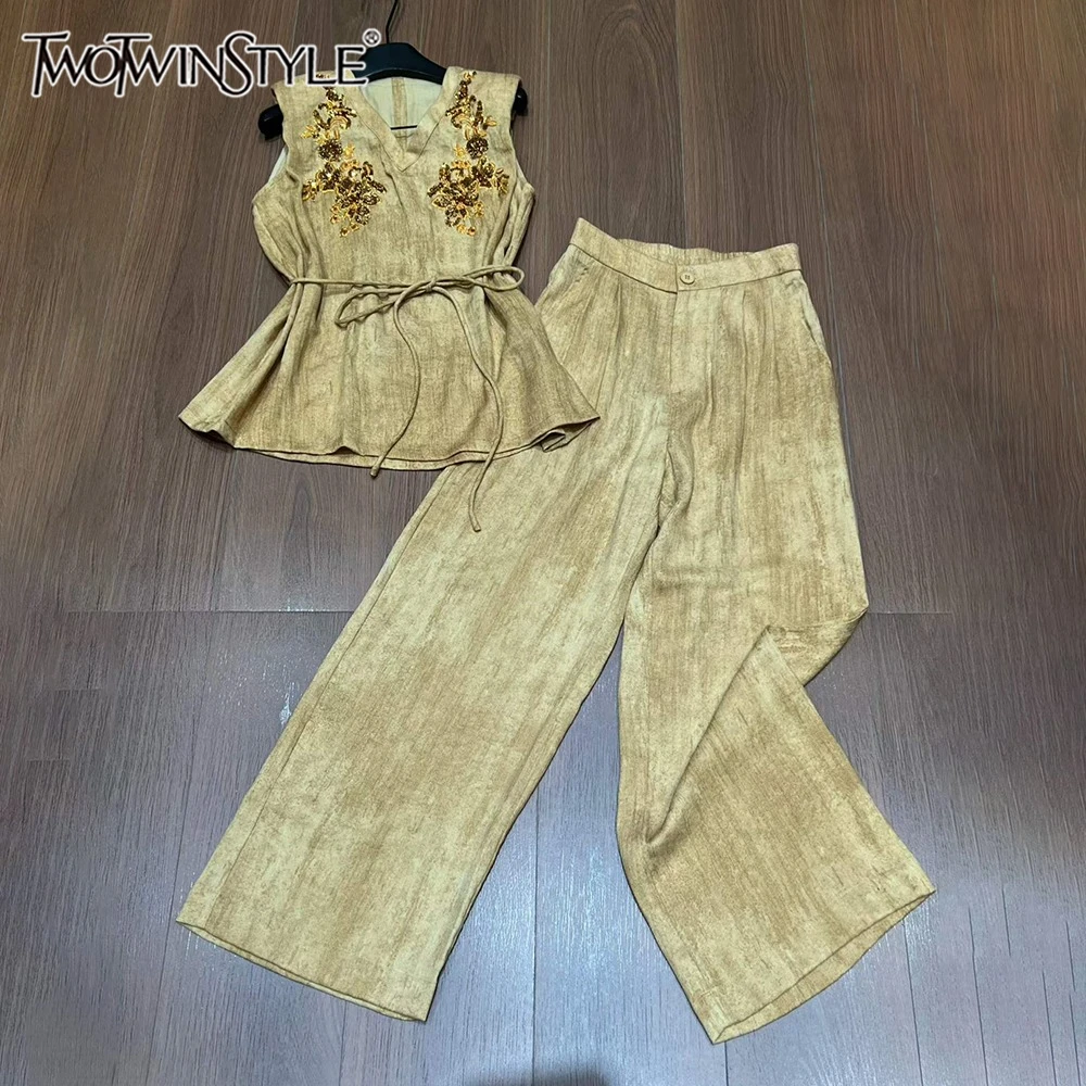 

TWOTWINSTYLE Beach Vacations Yellow Sequined Accent Two Piece Set for Women Sleeveless Belted Top Wide Leg Pants Sets KSE563679