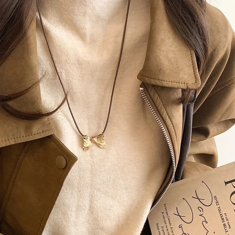 

Korean New Fashion Bowknot Pendant Necklace for Women Elegant Imitation Pearl Leather Rope Long Sweater Chain Charm Jewelry Gift