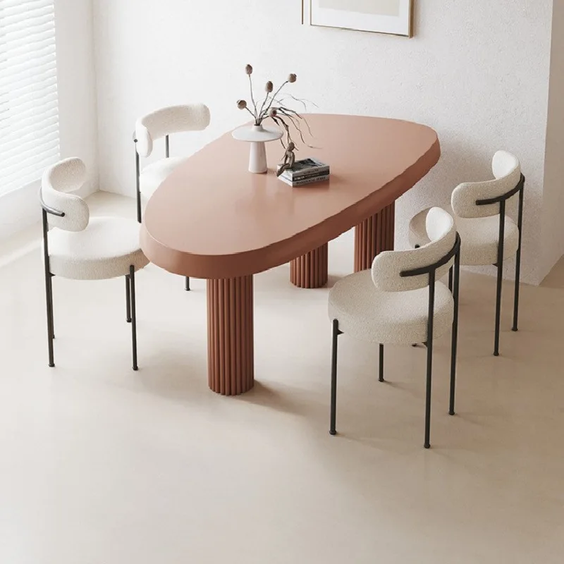 

Nordic cream style solid wood dining table modern simple oval eating table small apartment household dining table and chair comb