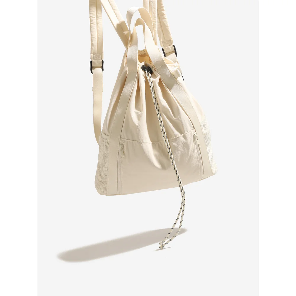 

Lightweight and large capacity outdoor drawstring backpack hand-held tennis and badminton bag, casual drawstring travel backpack