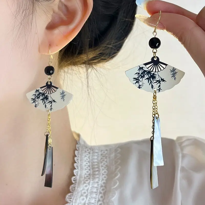 

New Chinese style artistic retro style fan shaped tassel earrings with a high-end and personalized temperament