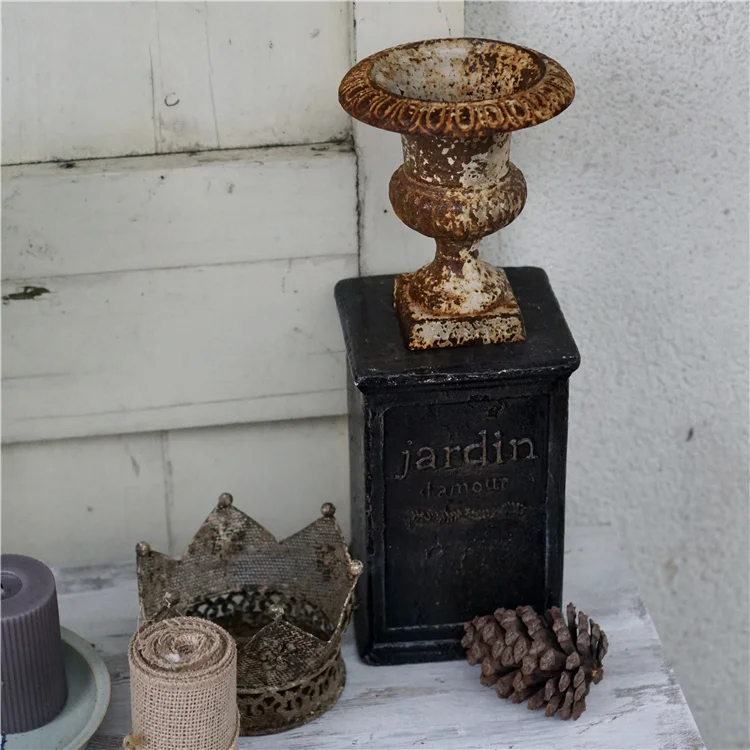 Retro and old outdoor courtyard garden balcony with decorative pillar ornament flower pot base