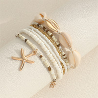 7 Pcs Stackable Starfish Pendant Bracelet Set with Mini Seed Beads - Handcrafted Beach Jewelry for Women